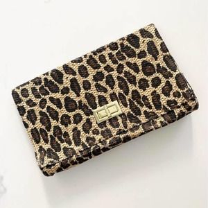 Cheetah Print Woven Clutch - moving sale!